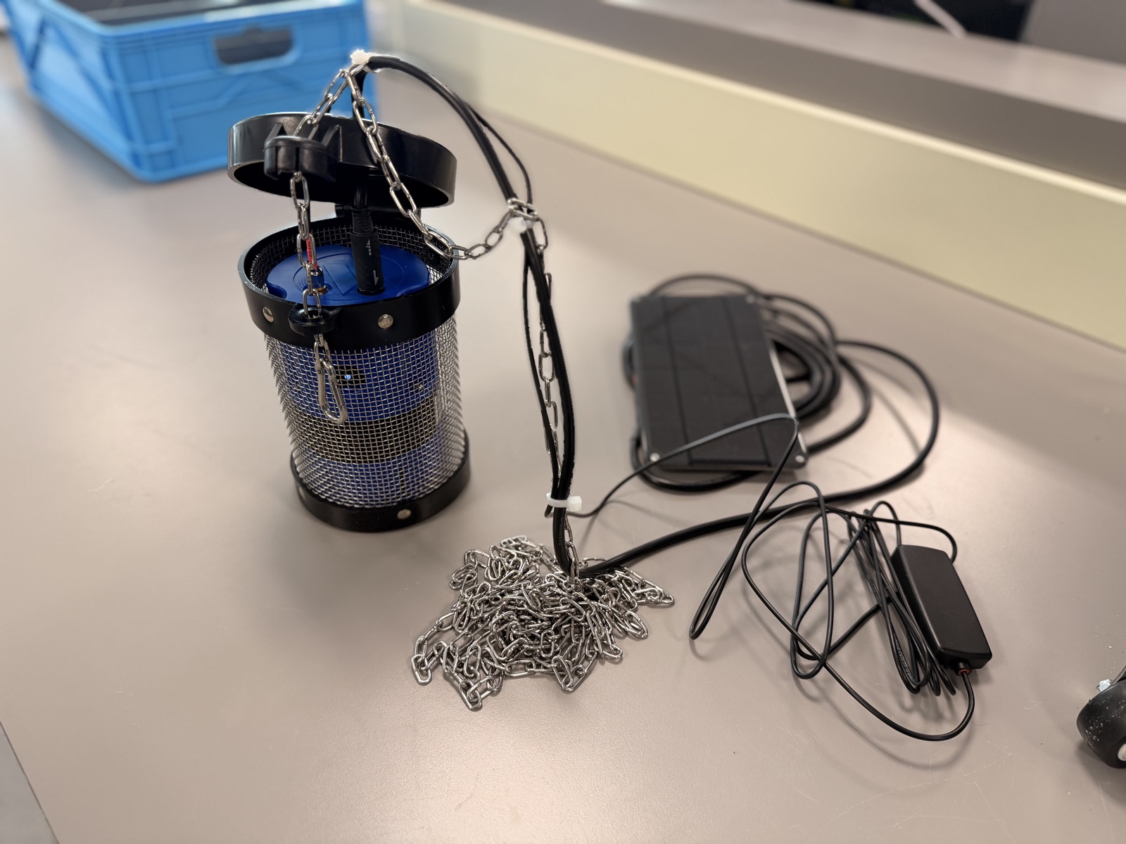 Cables zip-tied to the suspension chain
